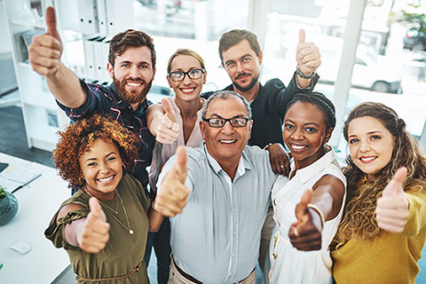 Group Of People with Thumbs in the Air