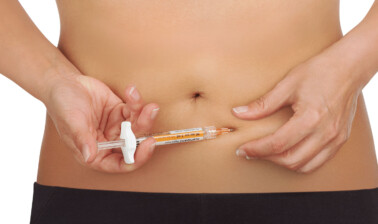 Hold the fold of skin. Bring the syringe to the skin and quickly insert the needle into the skin fold. 12. Insert the Needle